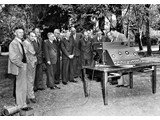 1954 : April in Canberra - National Mapping Council Members inspecting the Geodimeter NASM-1 (L-R) Unknown, Unknown, WV Fyfe (Western Australia), ED Blackwood (Tasmania), GW Vincent (New South Wales), JNC Rogers (Commonwealth Surveyor General), Col. L FitzGerald (Representing CSC), ED Mellor (Queensland), FW Arter (Victoria), GRL Rimington (NMO), HL Fisk (South Australia), Dr KW Rohnstock (New South Wales), BP Lambert (National Mapping).
